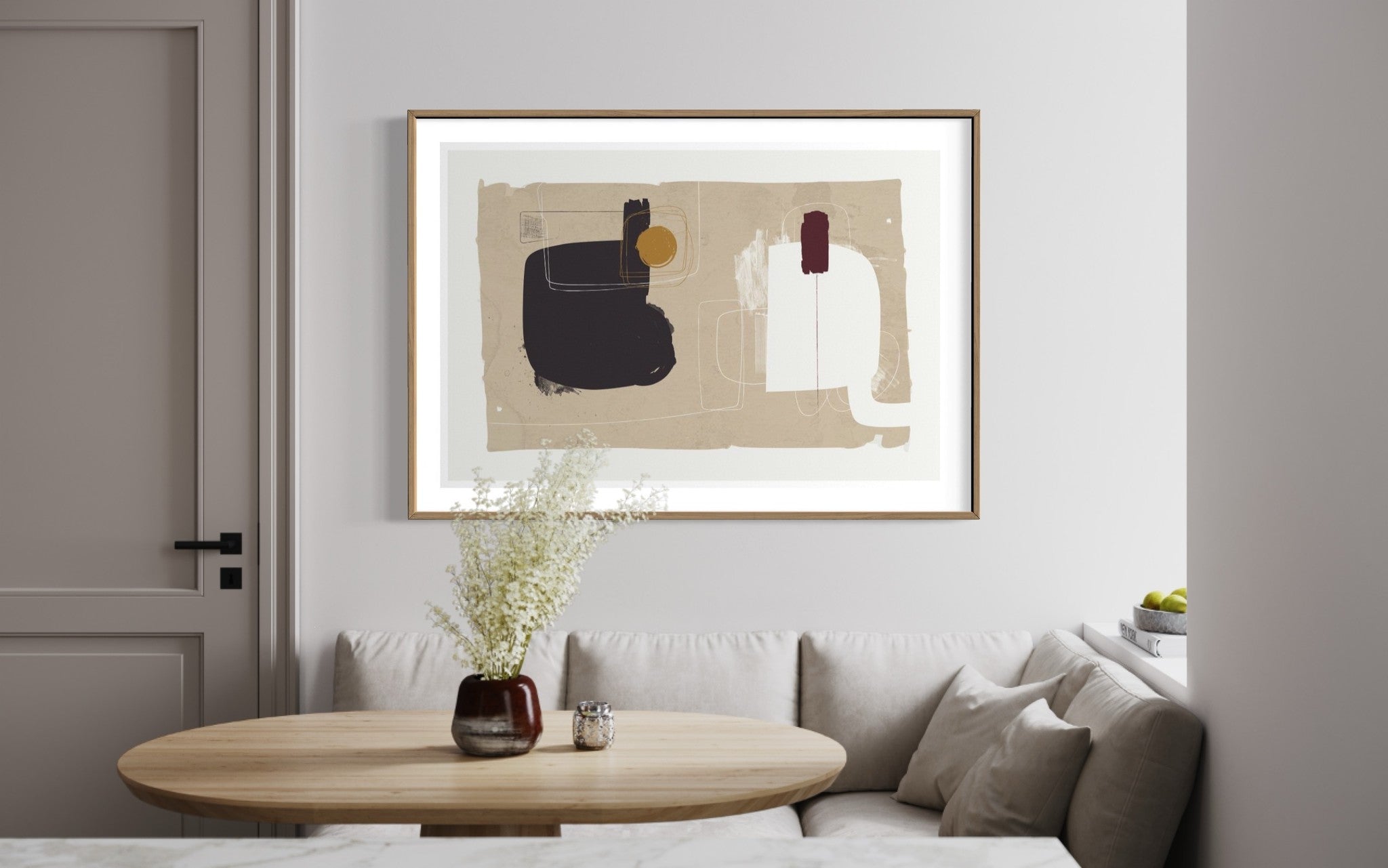 Modern living room with abstract art on the wall, a sofa, and a coffee table.