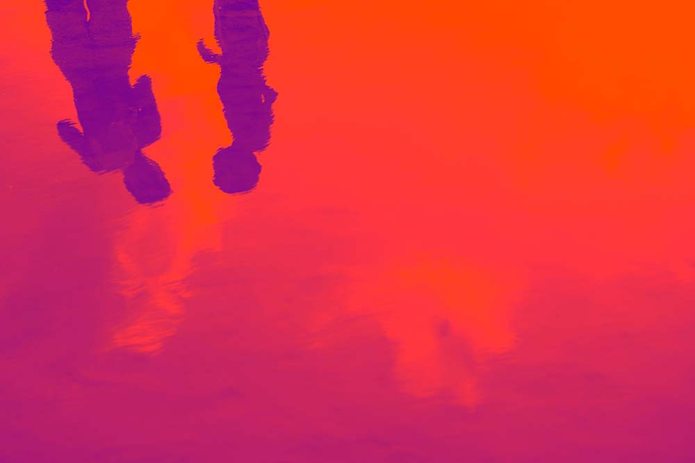 Reflections on the Sea by Tal Paz-Fridman-abstract fine-art photography in red and violet tones