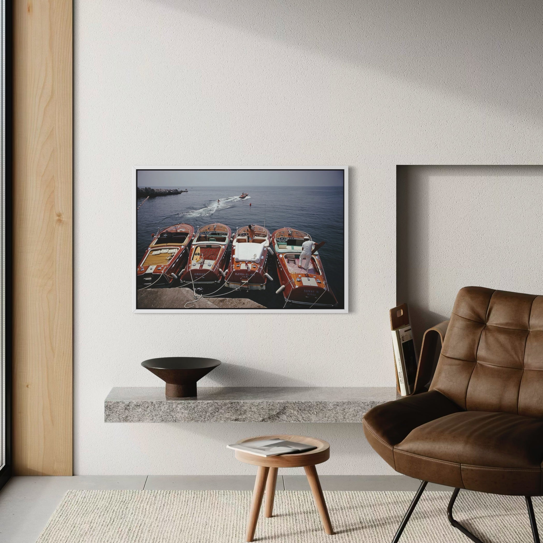Riva Boats at Hôtel du Cap-Eden-Roc by Slim Aarons shown above a modern bed setting, metal print curated for Mediterranean-inspired interiors by The Picturalist