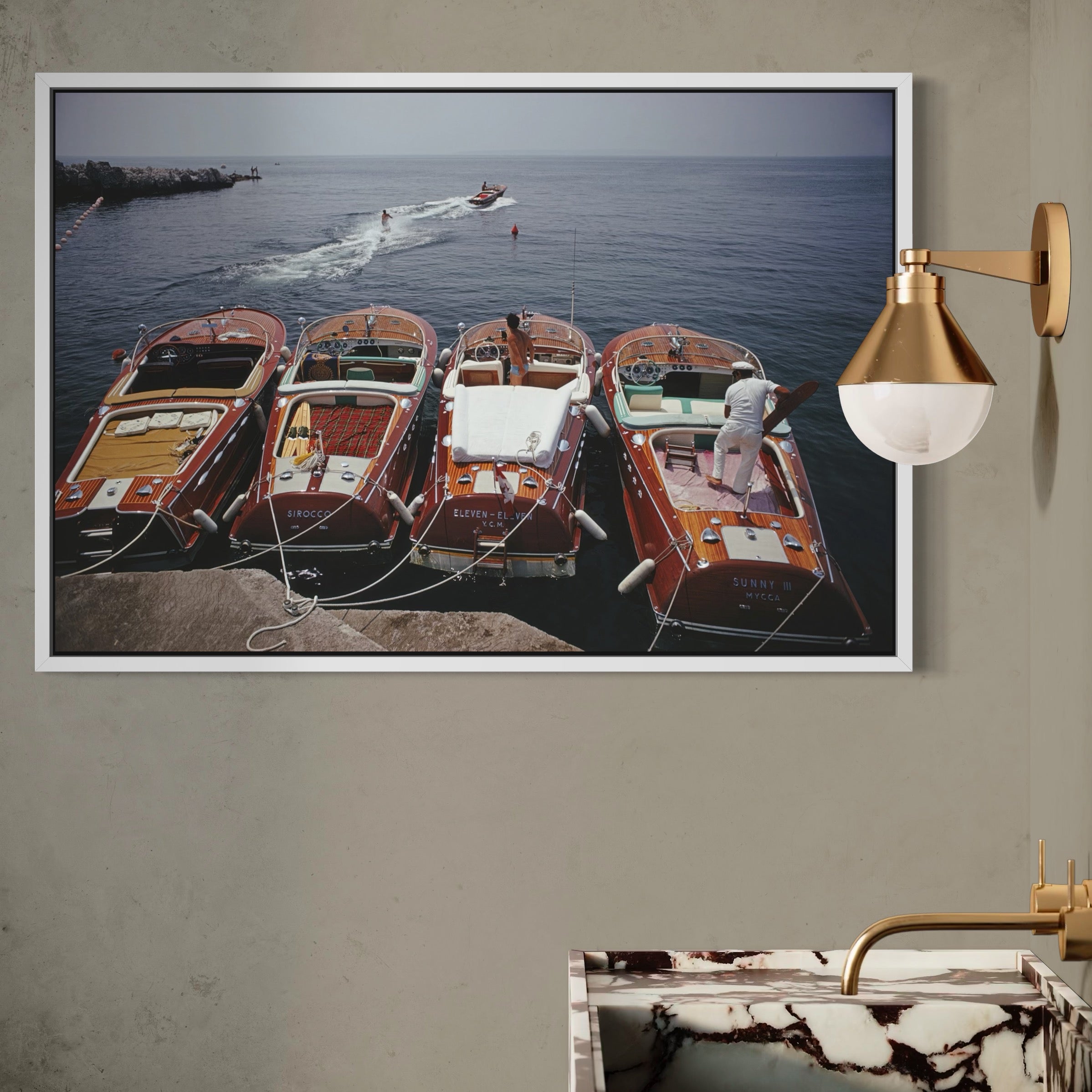 Riva Boats at Hôtel du Cap-Eden-Roc by Slim Aarons displayed in a hospitality dining setting, luxury metal print styled for boutique hotels and resort interiors by The Picturalist.