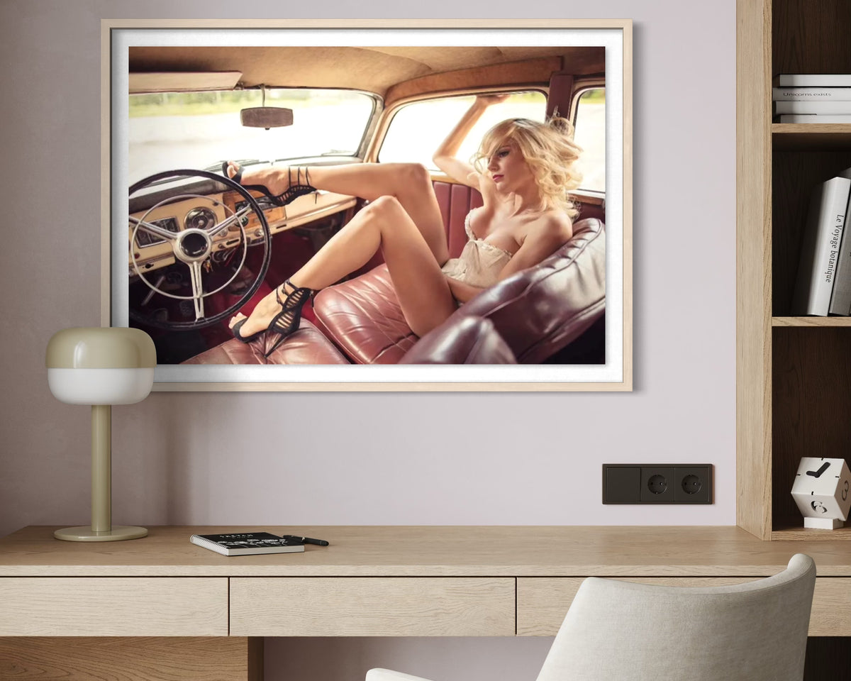 Fashion Model photographed inside a vintage car weraing high heels