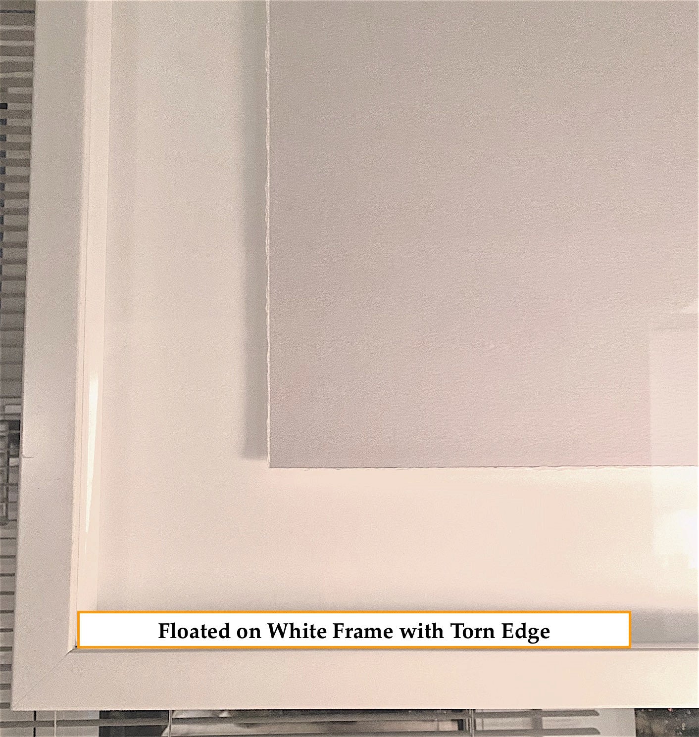 Floated on White Frame with Torn Edge