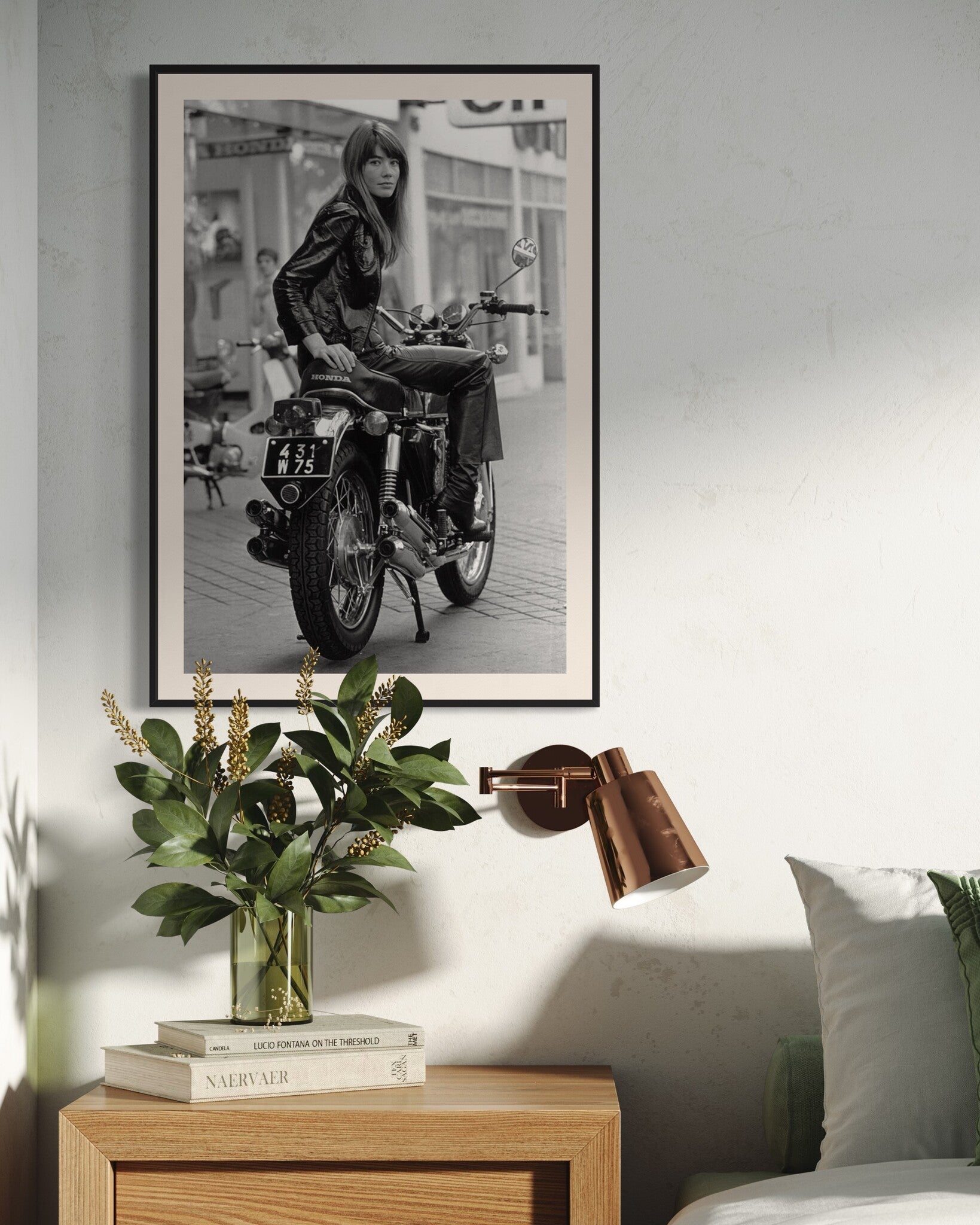 Françoise Hardy seated on a Honda motorcycle, Paris 1960s, photograph by Reg Lancaster
