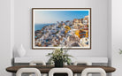 Beautiful View of Oia in Santorini by George Pachantouris, fine art photograph of whitewashed homes and Aegean Sea, framed by The Picturalist