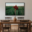 Walking at Sunset by Igor Ustynskyy, showing a figure in a long coat moving through a lush field at golden hour, available from The Picturalist for designer-grade wall decor, curated art collections, and tailored art solutions for residential, hospitality, and commercial spaces.