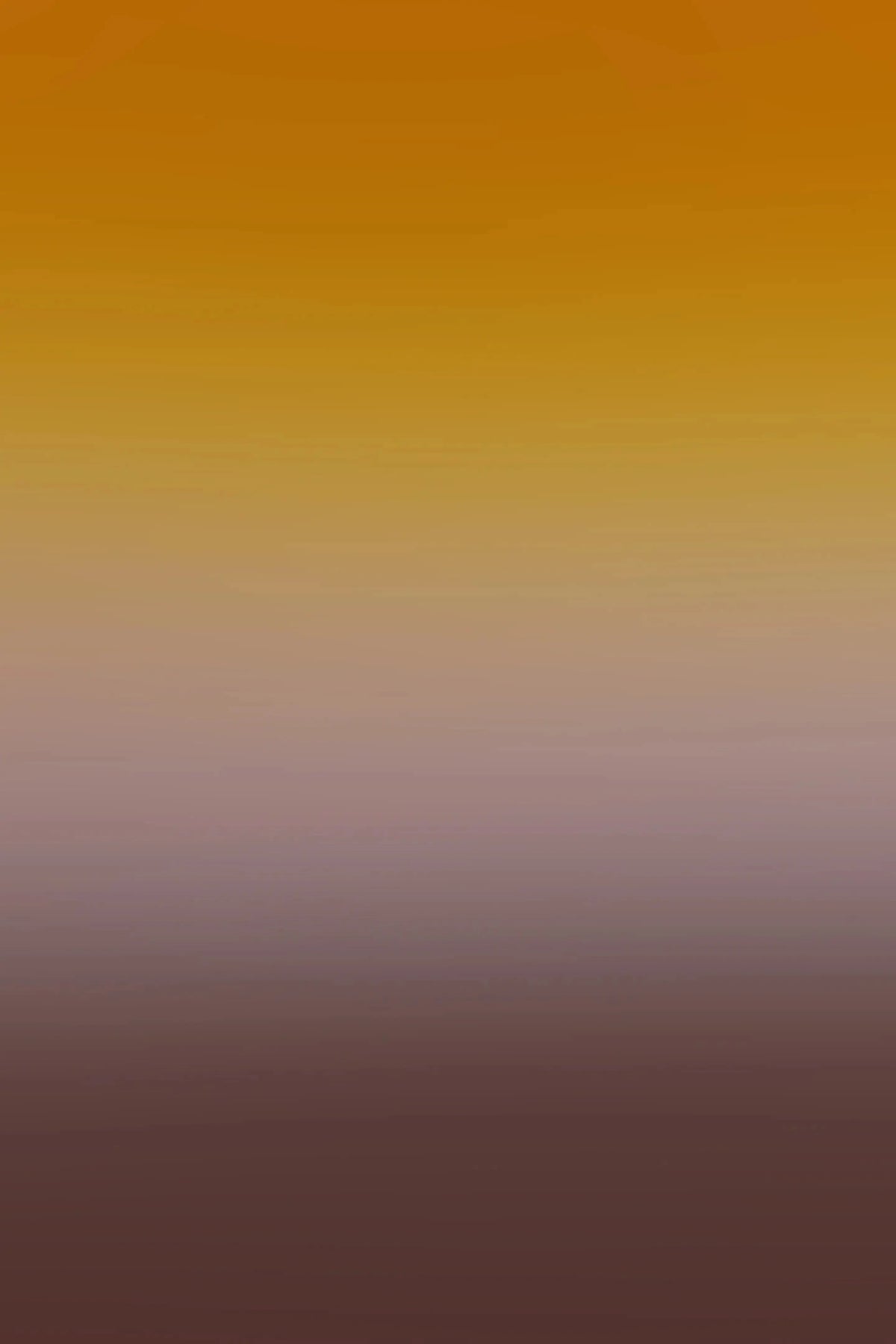 A smooth vertical gradient transitioning from a warm golden yellow at the top, through soft beige in the middle, to a deep muted plum-brown at the bottom.
