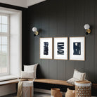 Modern interior with dark paneled walls, a wooden bench, and decorative items.