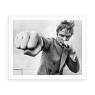 Michael Caine Throwing A Punch by Stephan C. Archetti — illustrative matte-white framed paper print with white mat; proportions vary by size.