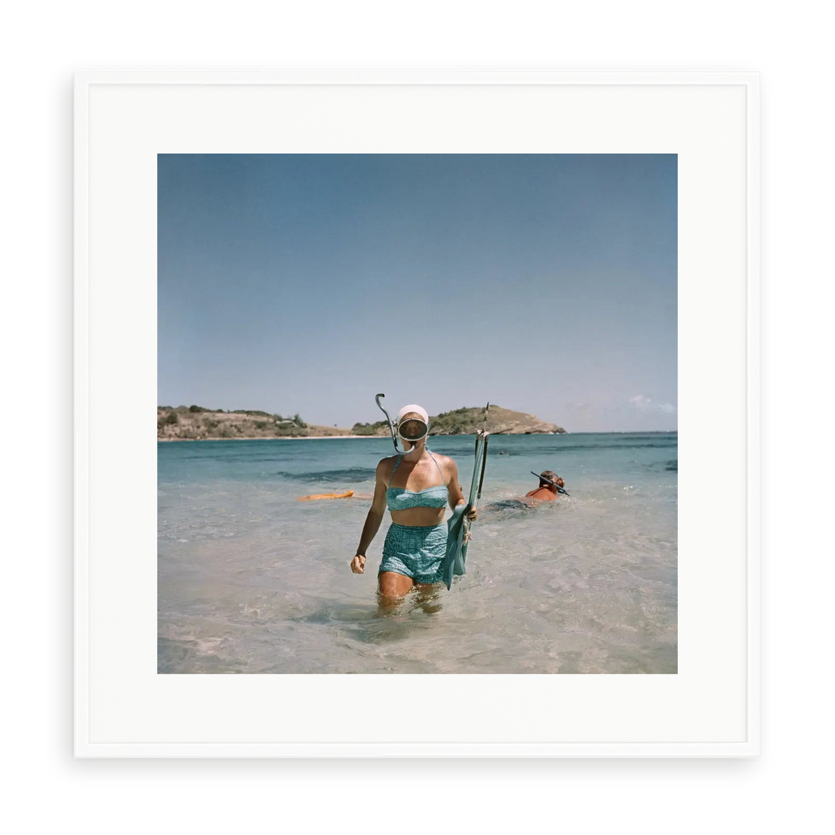 Illustrative matte-white framed preview with white inner border of Snorkelling In Antigua by Slim Aarons. Proportions vary by size.