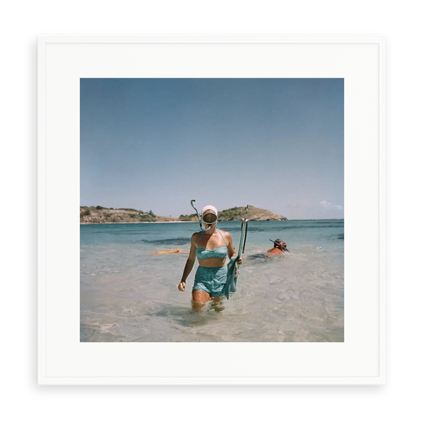 Illustrative matte-white framed preview with white inner border of Snorkelling In Antigua by Slim Aarons. Proportions vary by size.