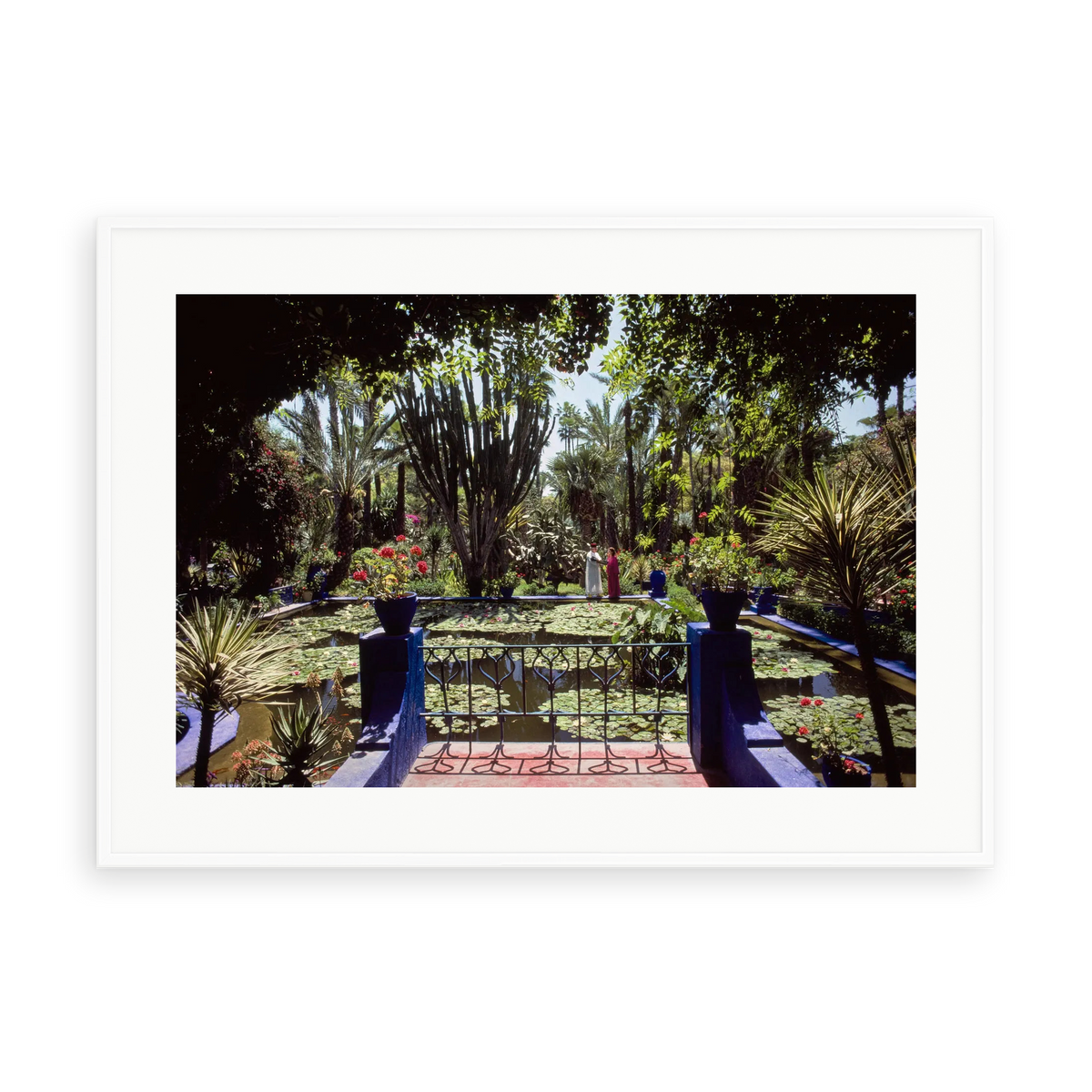Illustrative matte-white framed preview with white inner border of Majorelle Gardens by Slim Aarons. Proportions vary by size.