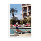 Illustrative matte-white floater-framed preview, without added mat, of Poolside in Marrakesh Morocco by Slim Aarons. Proportions vary by size.