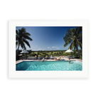 Illustrative matte-white framed preview with white inner border of Cotton Bay by Slim Aarons. Proportions vary by size.