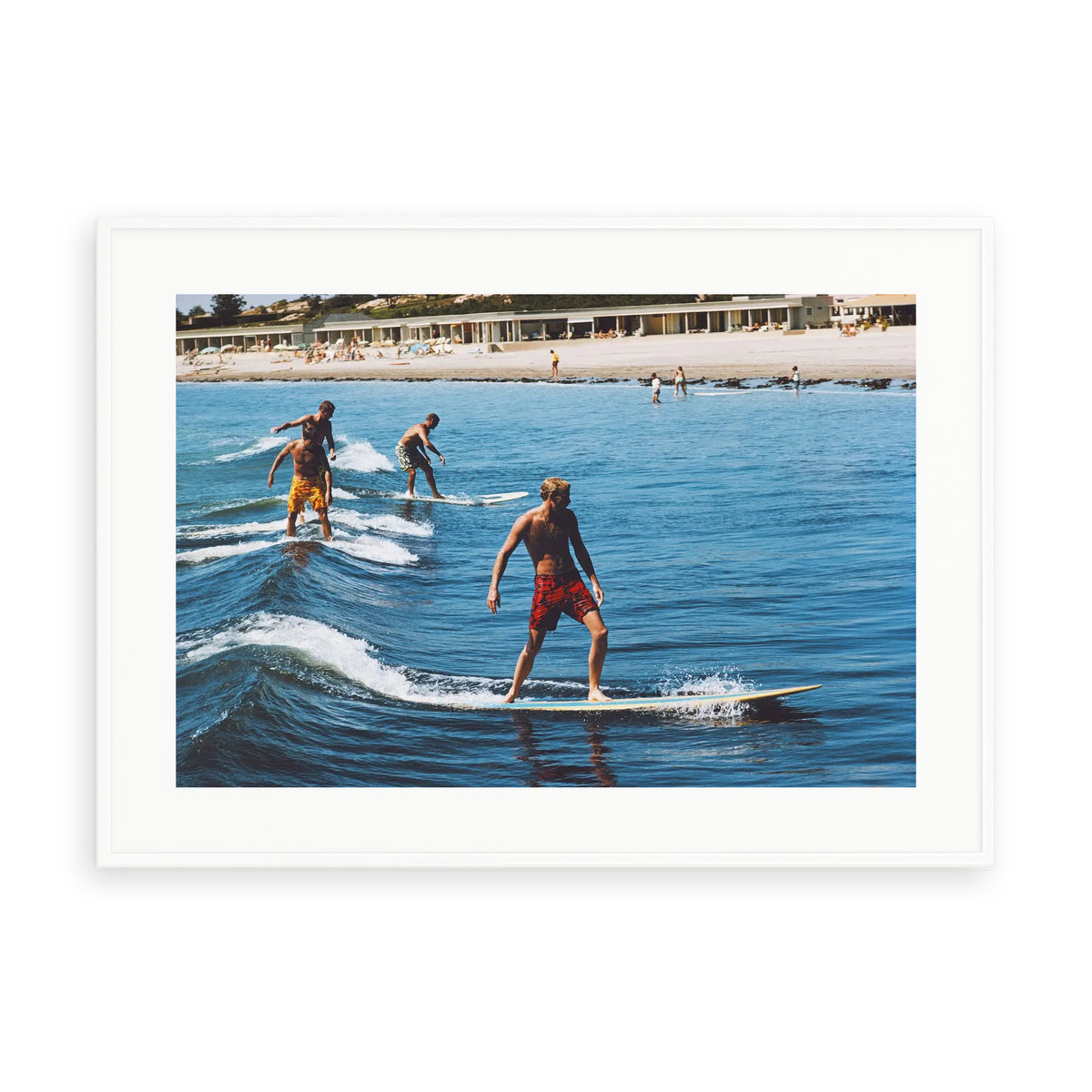 Illustrative matte-white framed preview with white inner border of Surfing Brothers by Slim Aarons. Proportions vary by size.