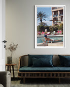 Poolside in Marrakesh Morocco by Slim Aarons displayed as framed photography in a luxury living room