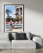 Poolside in Marrakesh Morocco by Slim Aarons displayed as framed photography in a luxury living room