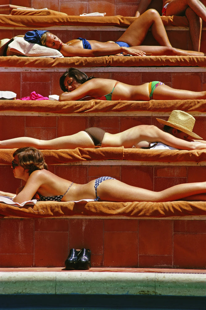 Sunbathing in Capri by Slim Aarons, Mediterranean fine art photograph printed on matte archival paper from Getty Images (asset #2663129). Available from The Picturalist.