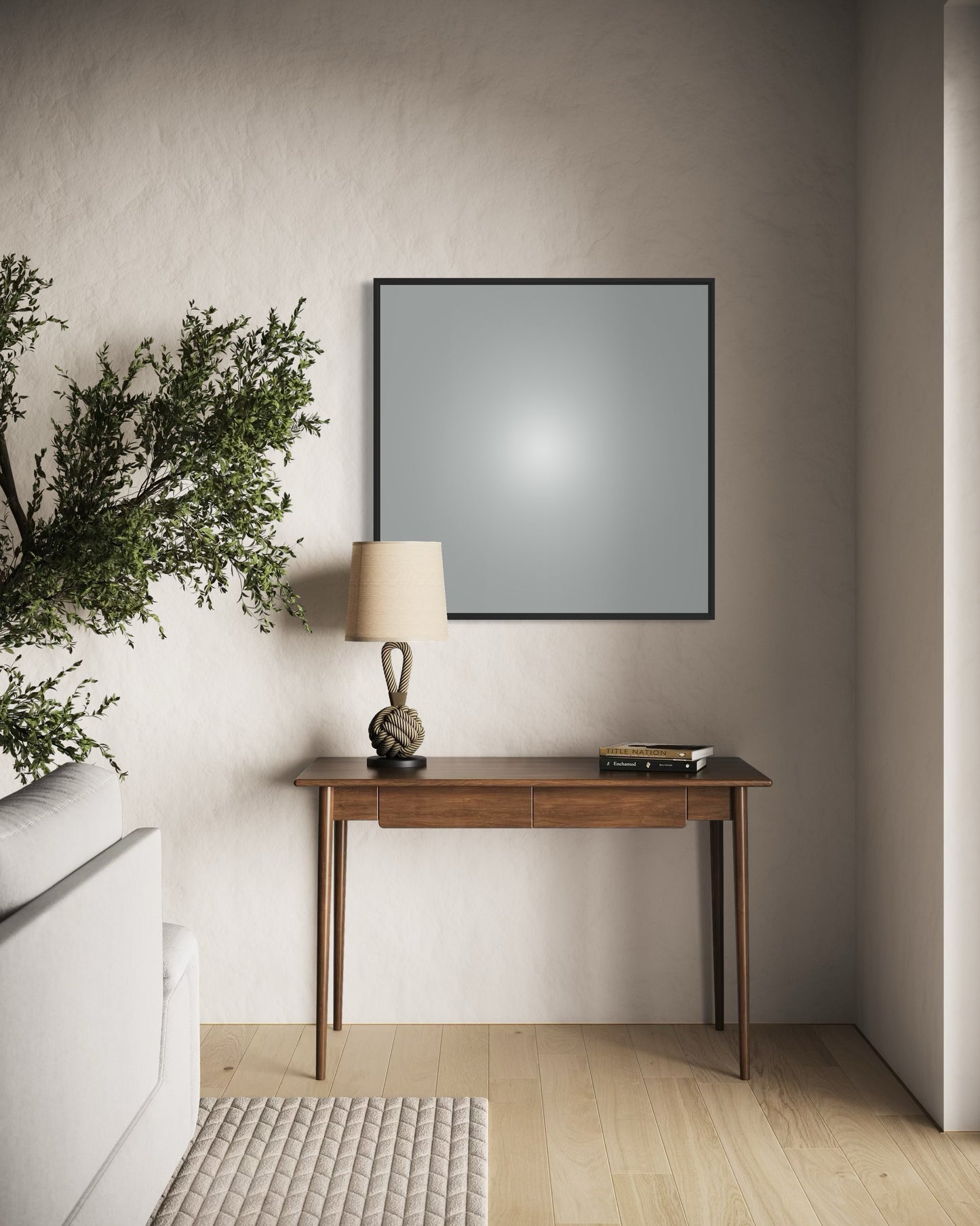 Modern interior with a wooden console table, lamp, and framed mirror on a neutral wall.
