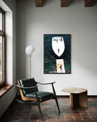Modern interior with a chair, table, and abstract artwork on the wall.