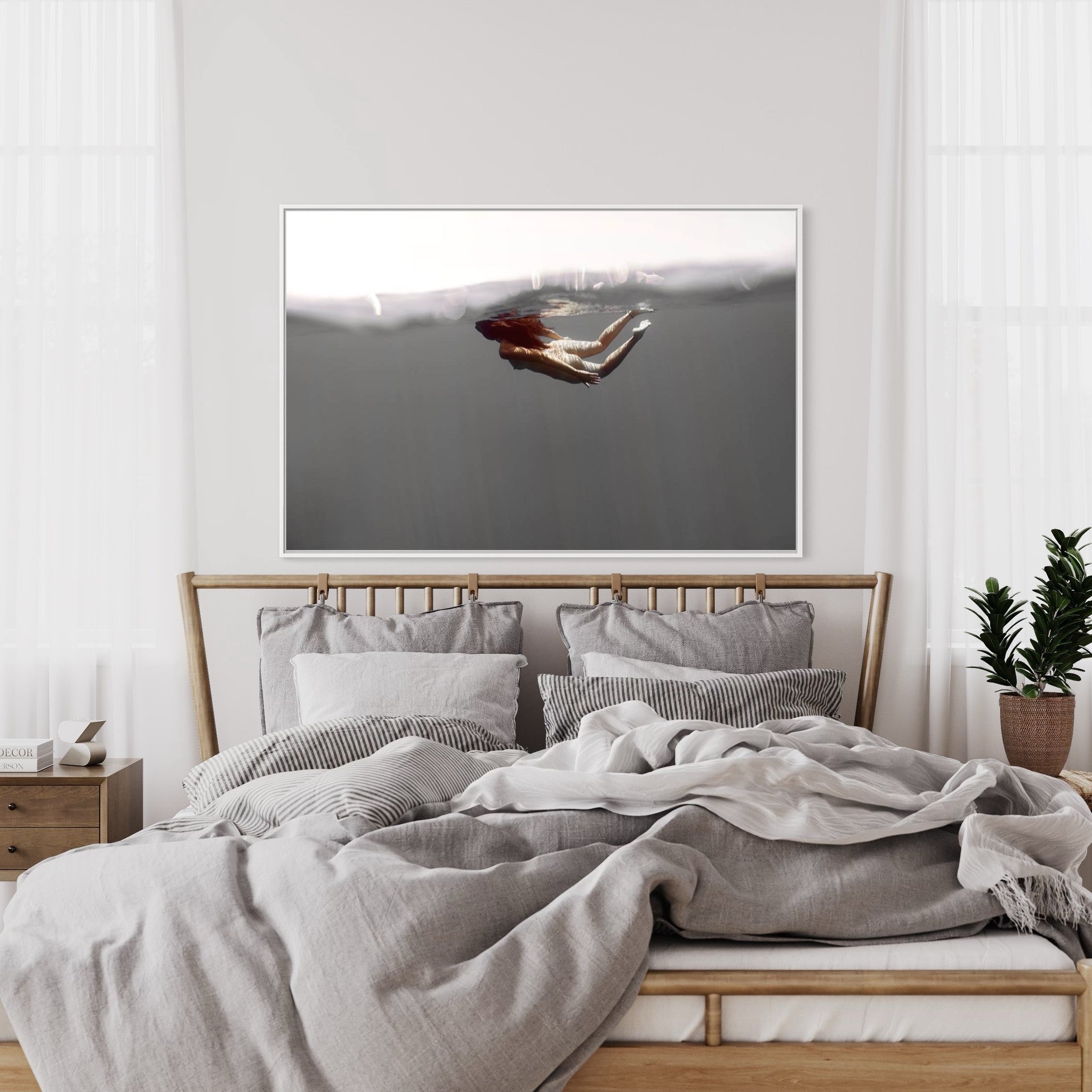 Splash by Enric Gener – underwater photograph of a swimmer suspended in soft light