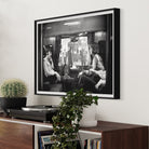 First Class Travel by Victor Blackman featured in a clean hallway gallery wall, ideal for real estate staging art and curated art collections.