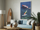 Living room with a couch, coffee table, and wall art of a kayaker and boat.